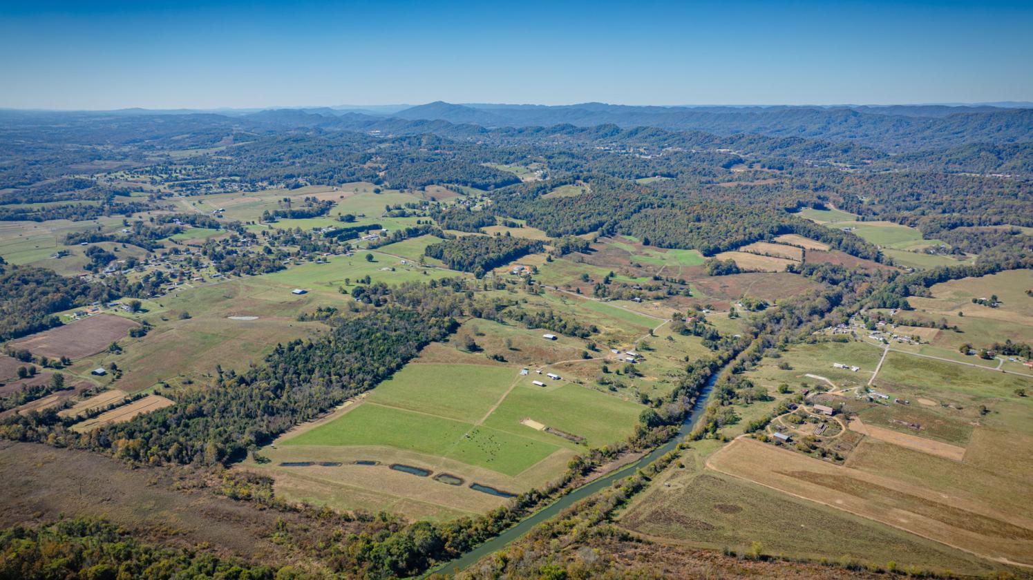 150 Acres and Farm House along Big Creek - photo 8